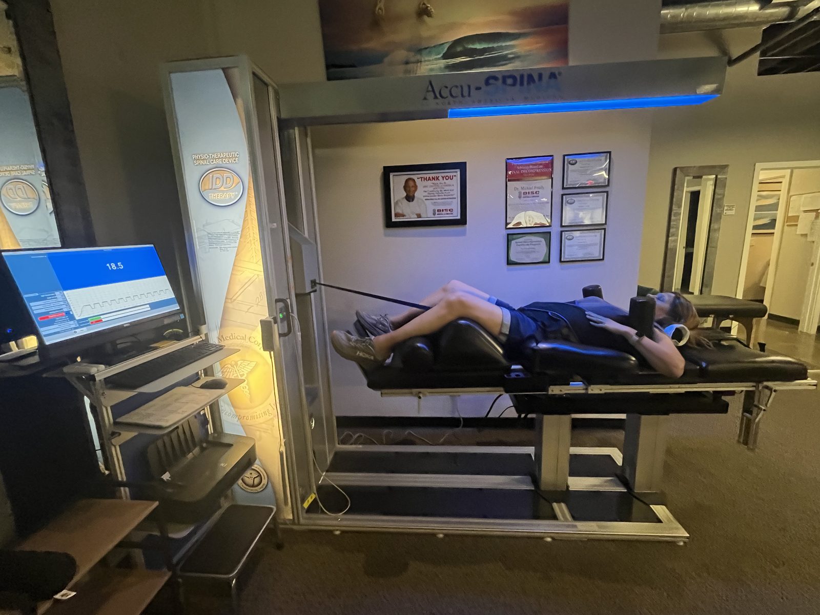 A patient receiving AccuSpina spinal decompression treatment