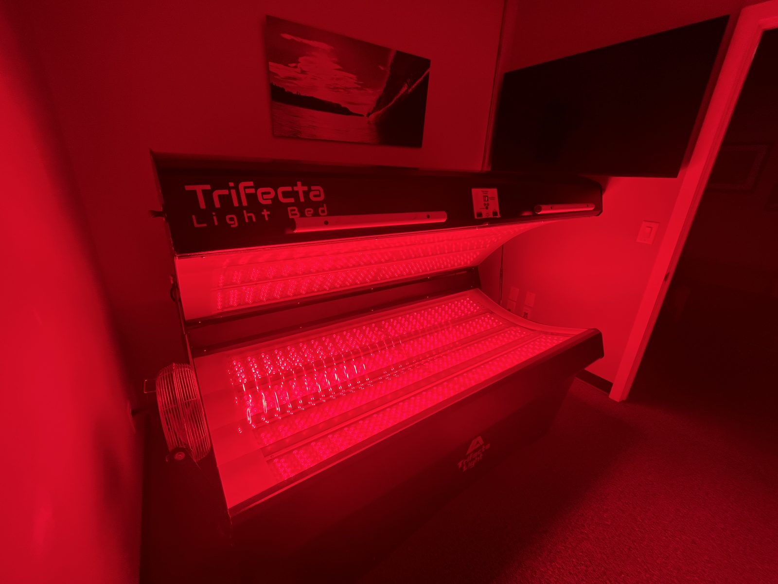 The Trifecta Light red light therapy bed at Foudy Chiropractic
