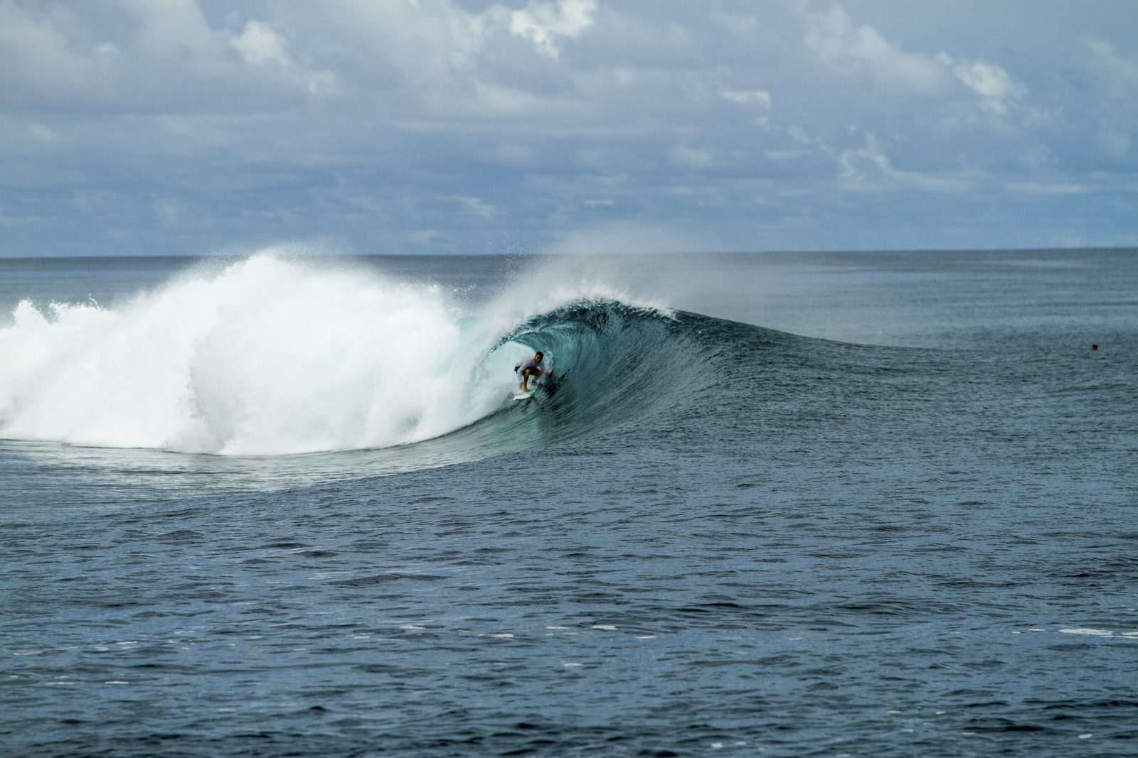 Dr. Michael Foudy surfing